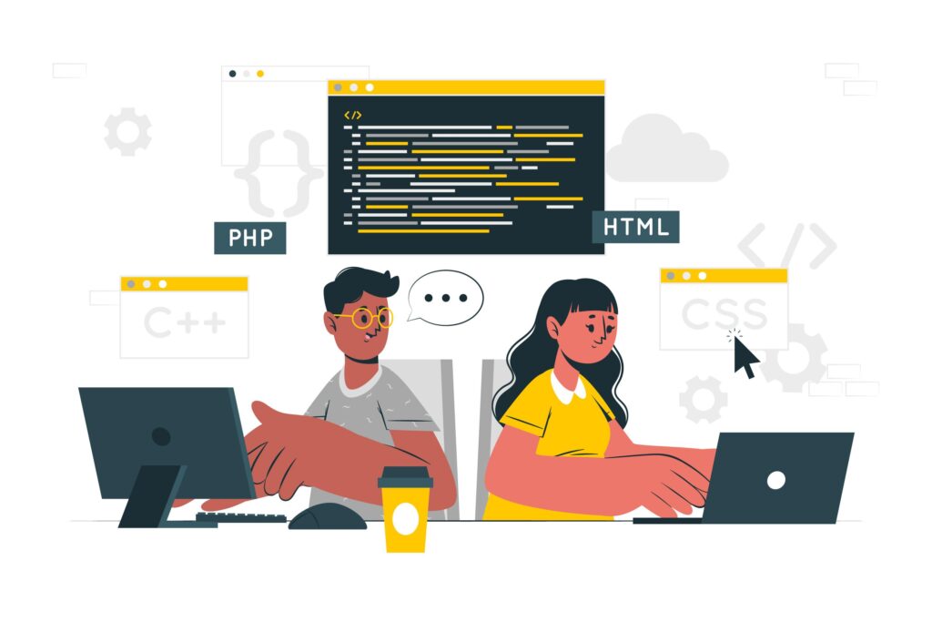Two colleagues in front of computers, writing a code together